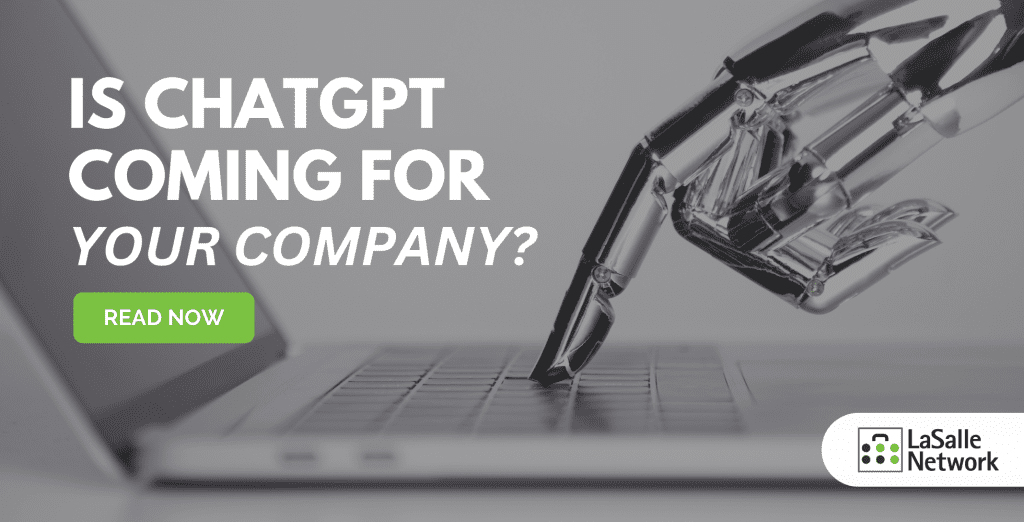 robot typing on laptop