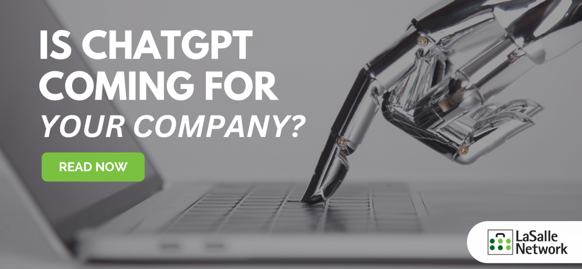 robot typing on laptop