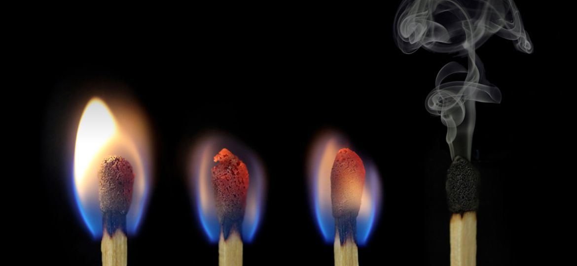 Close-Up Of Matchsticks Against Black Background